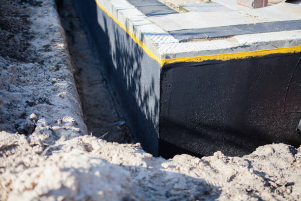 Professional Waterproofing technician working in Lawnside, NJ